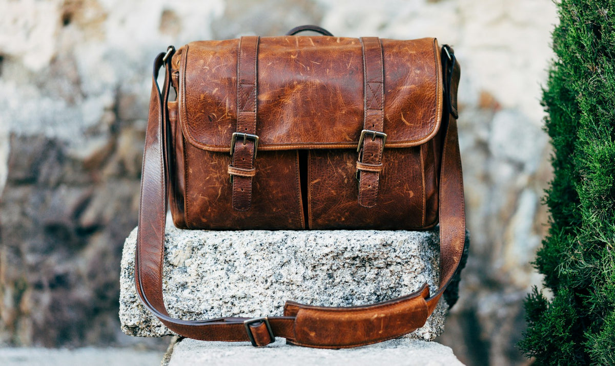 Brown leather messenger satchel
