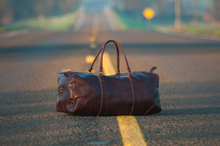 Brown leather weekender duffel bag